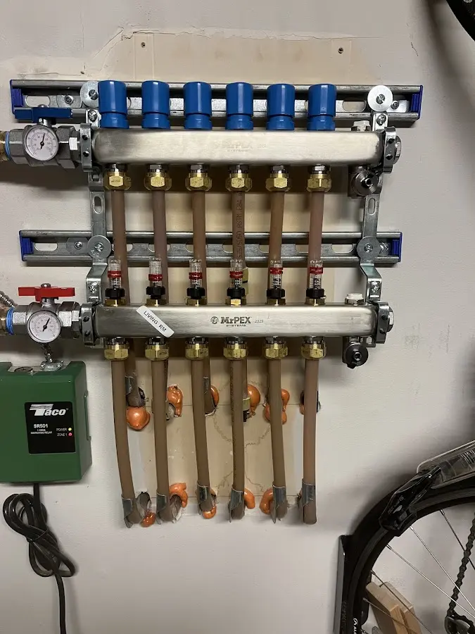 Plumber performing Leak Detection at a residential property in Dedham